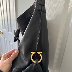 Farragomo Black Leather Shoulder Bag with Gold Accent